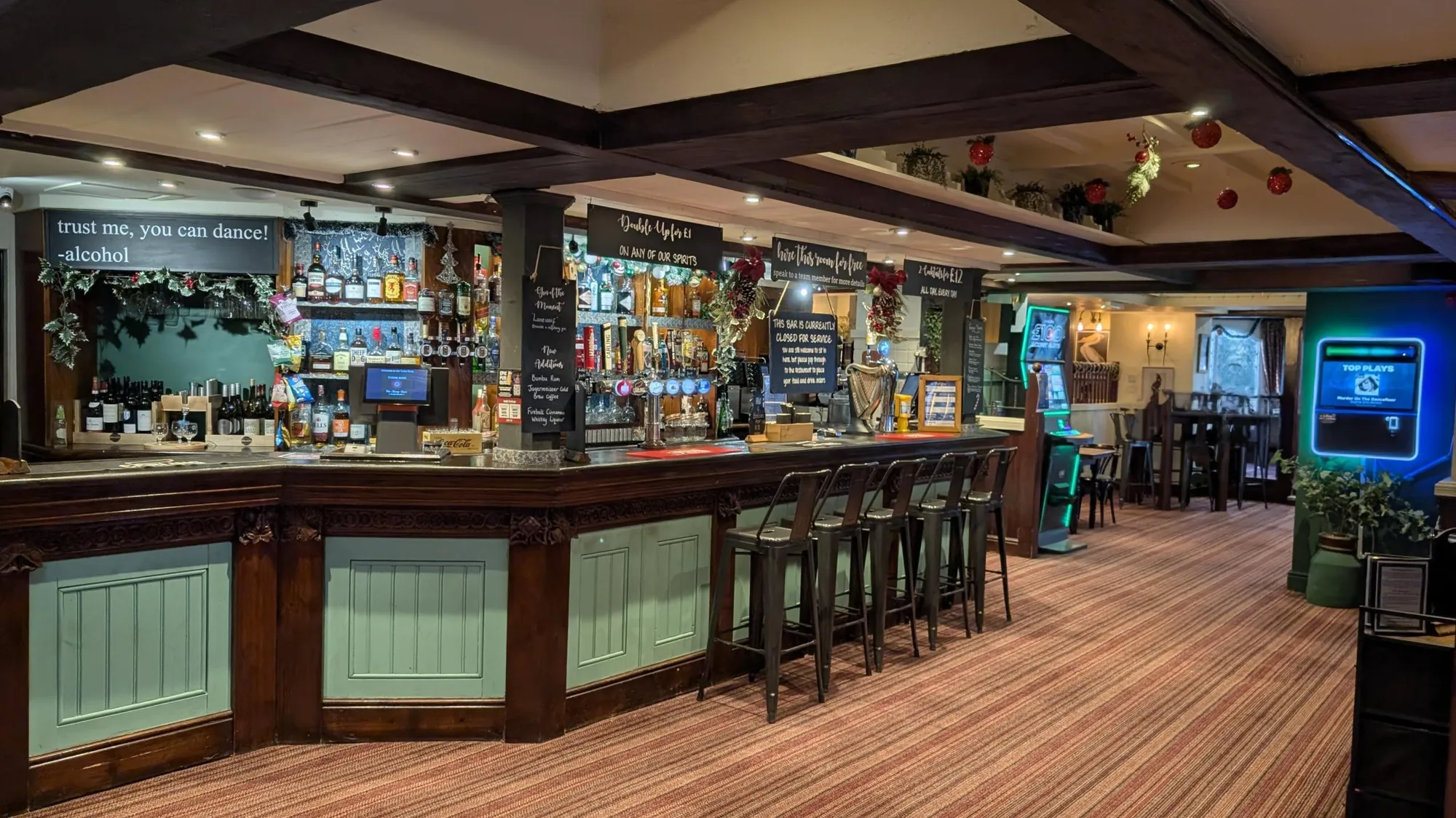 Warm wooden bar at Tudor Rose